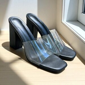 Cuccoo Heeled Mule in Clear/Black Size 37